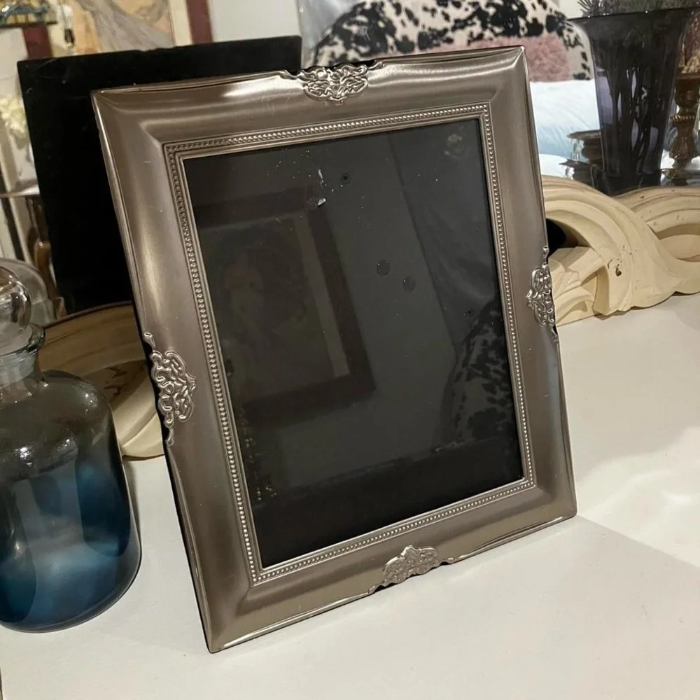 Vintage silver ornate frame 10” by 13”
